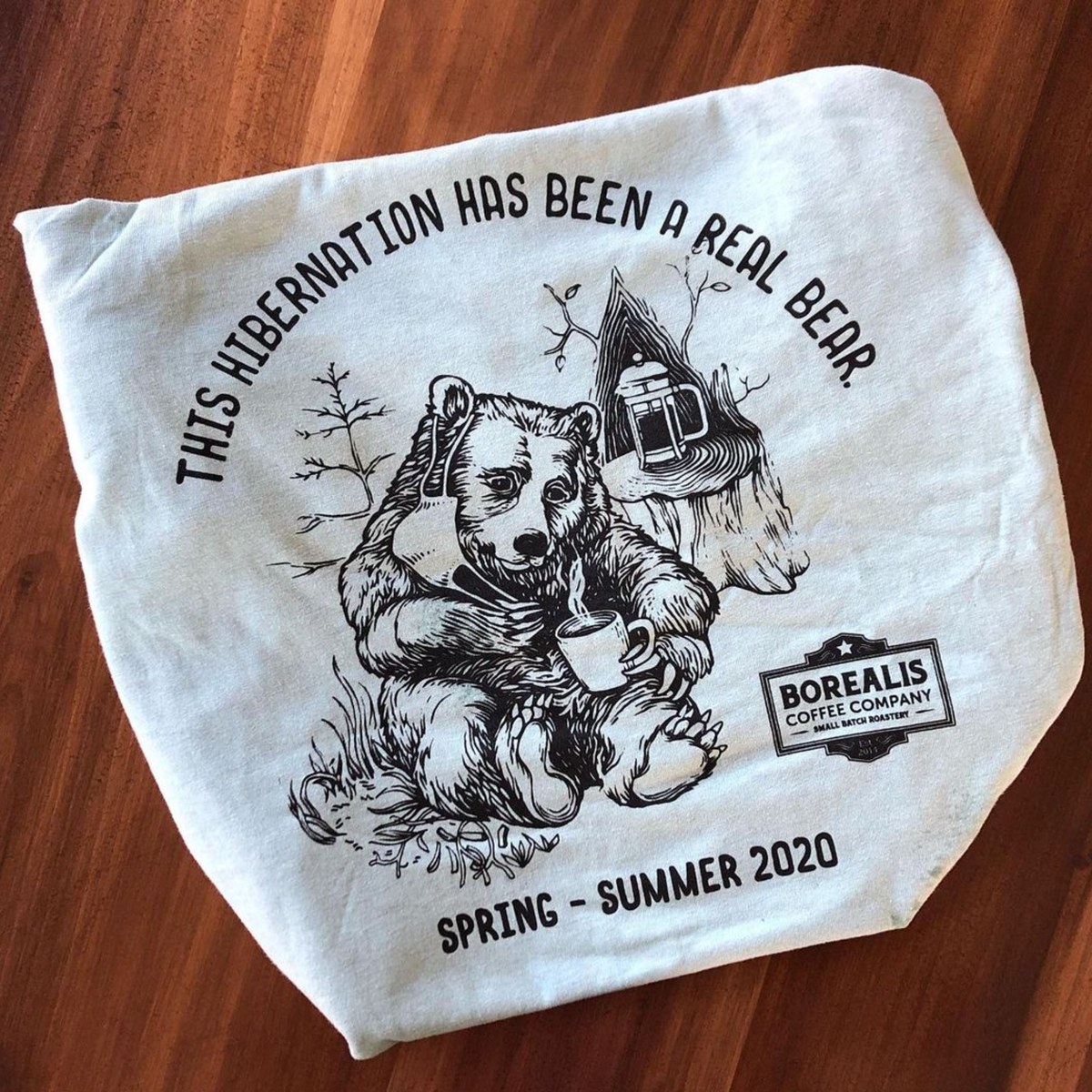 T-shirt with a hibernation joke, bear drinking coffee