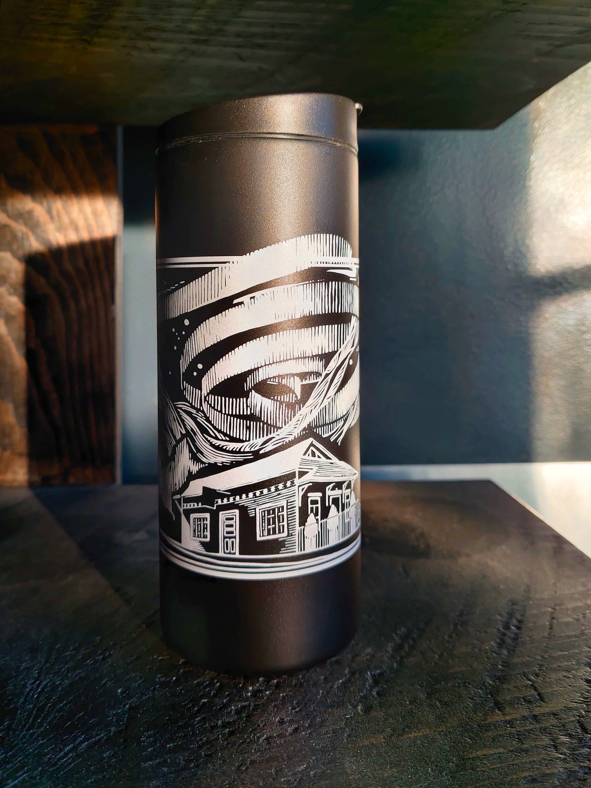 Anniversary tumbler close-up, engraved illustration