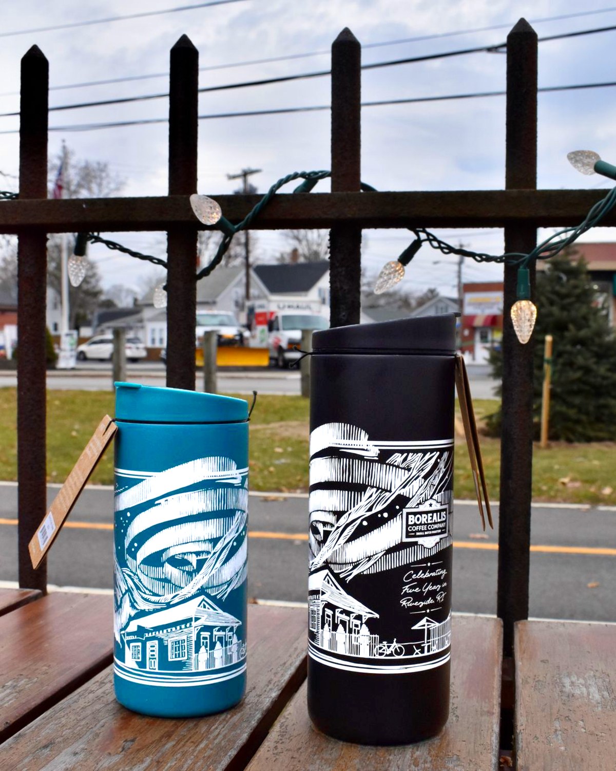 Two anniversary tumblers, teal and black