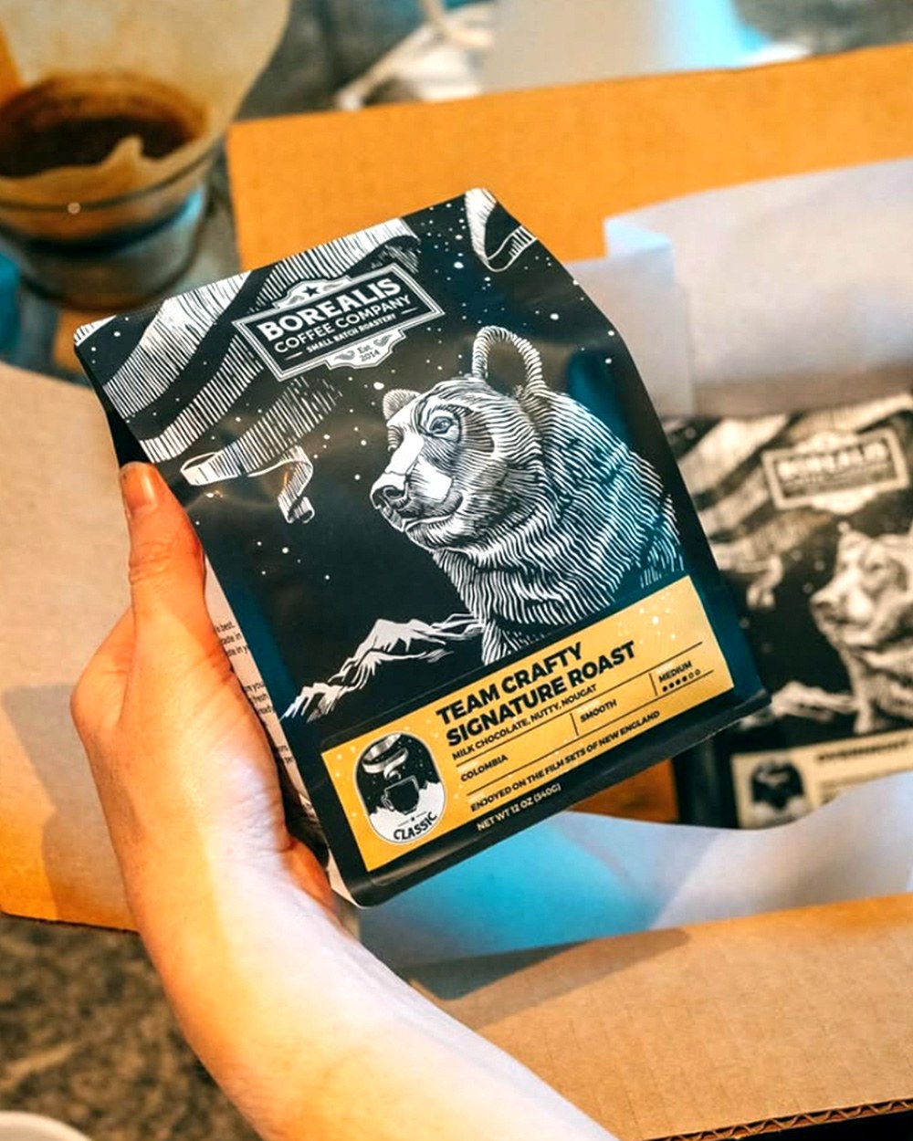 Borealis Team Crafty Signature Roast bag held in hand