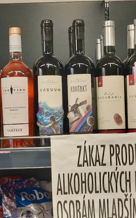 Vacuum and Контакт on a shop shelf in the Czech Republic