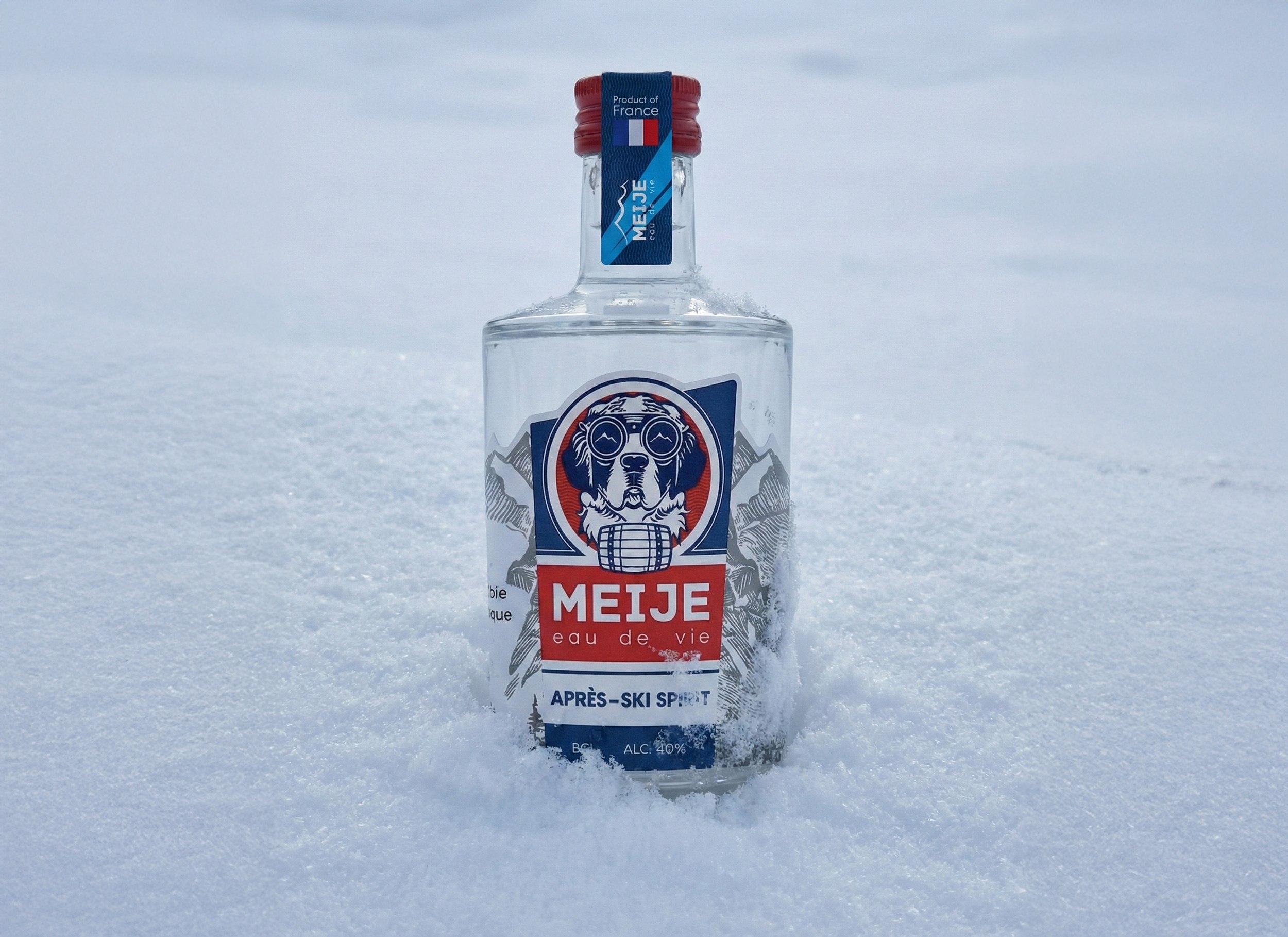 Meije bottle upright in fresh snow