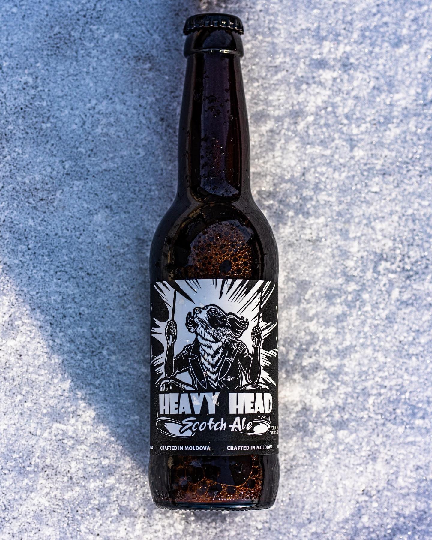 Heavy Head lying on ice, shot from above