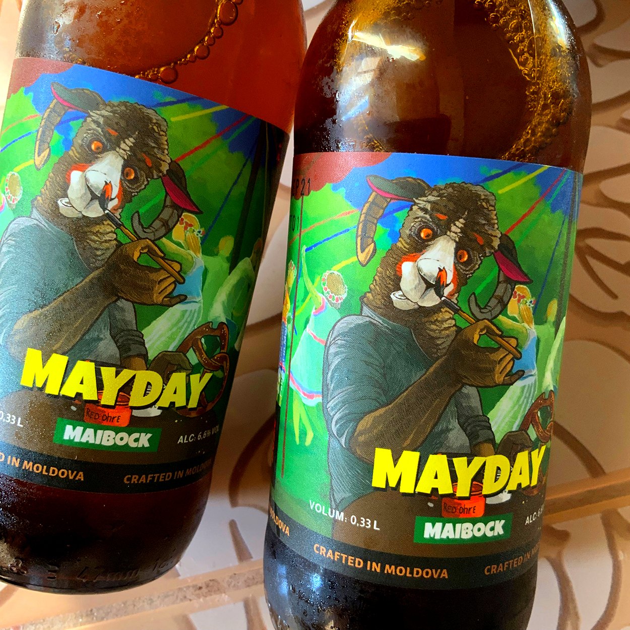 Two Mayday bottles clinking together