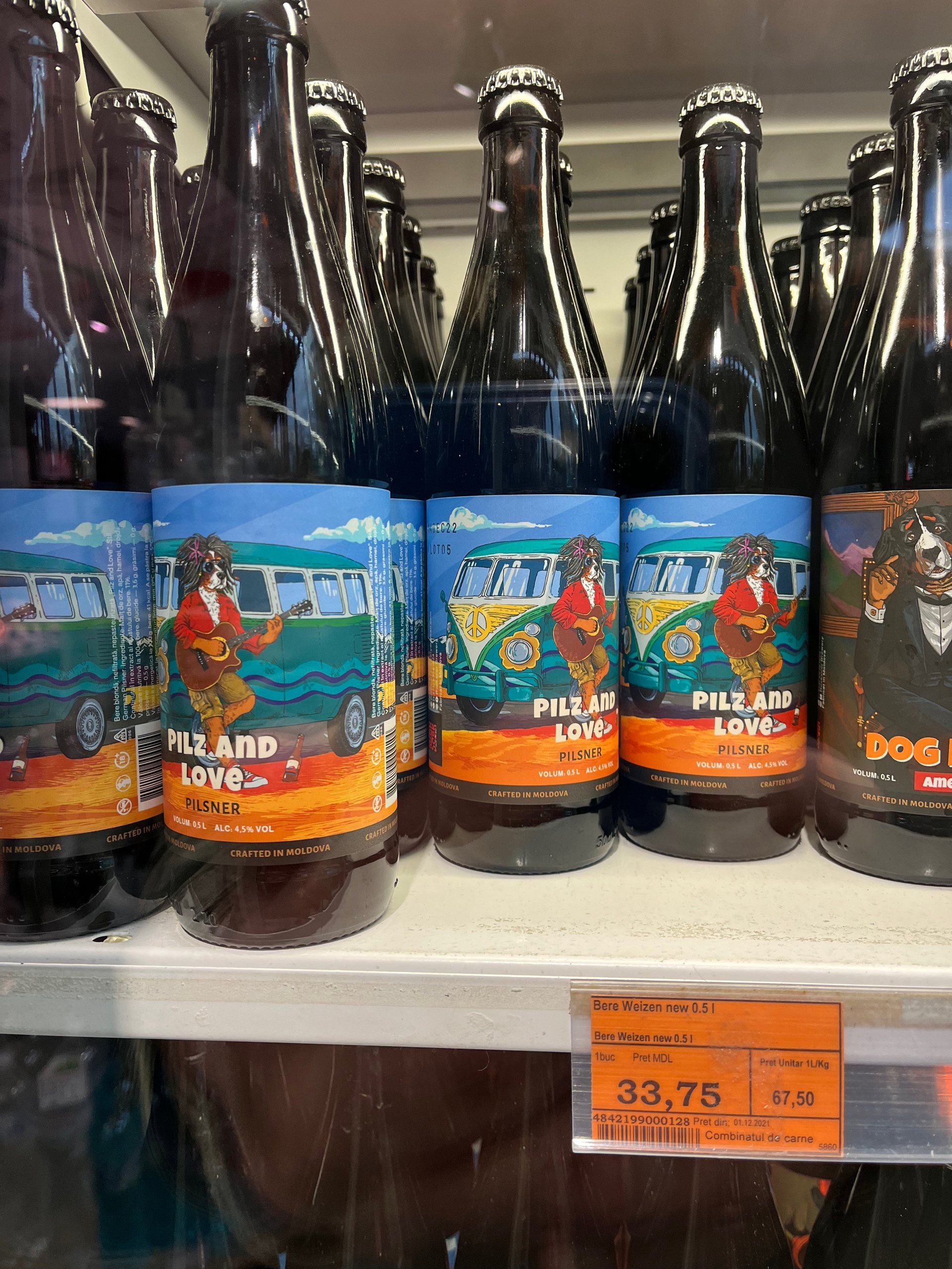 Pilz and Love and The Dog Father on a shop shelf, price tags below
