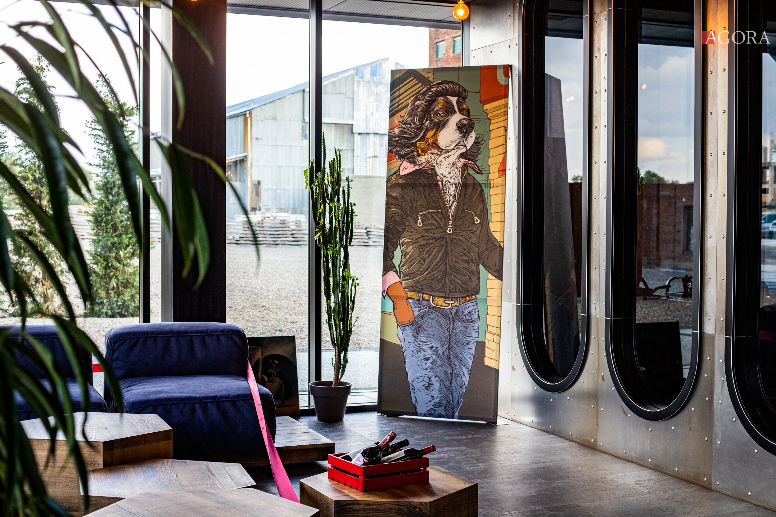 An Apallon roll-up banner standing in a lounge