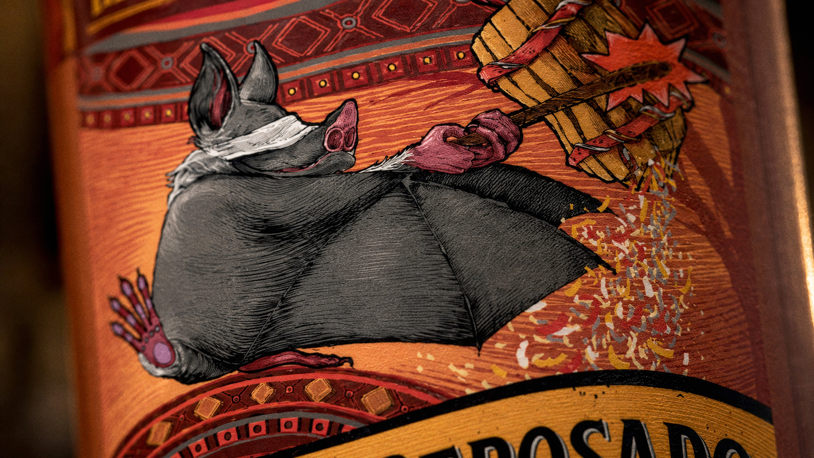 Macro of the Piñata Reposado label — a hand-drawn bat swinging at a piñata barrel, ornate border