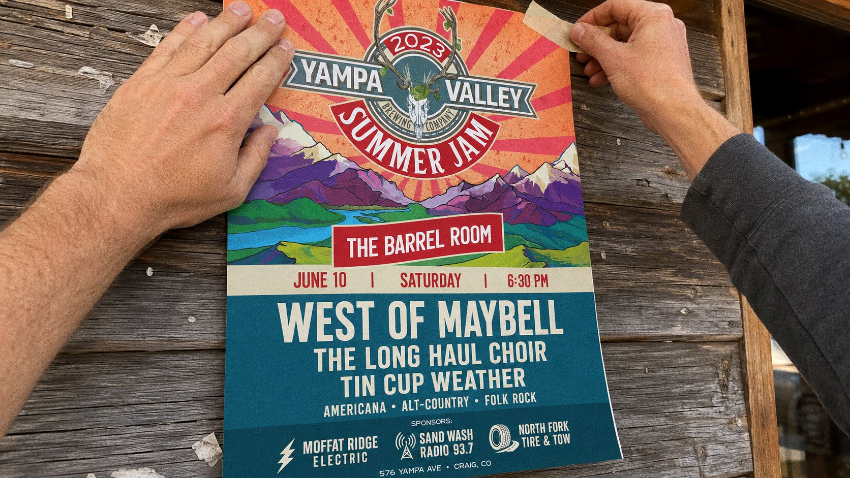 The Summer Jam poster pinned inside The Barrel Room, a wall of taps and a chalkboard behind it
